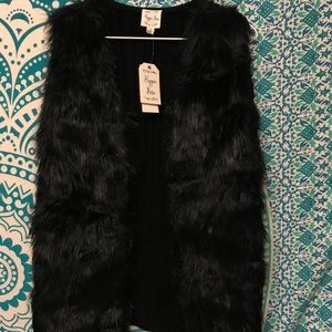 Brand new large faux fur vest from Macy